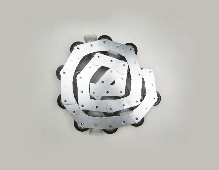 Прижимная цепь поручня, 18 роликов, d - 46 мм, шаг - 75 мм